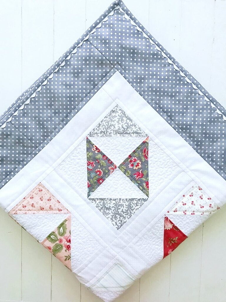 Pretty Petit Fours quilt made with Porcelain charm pack.
