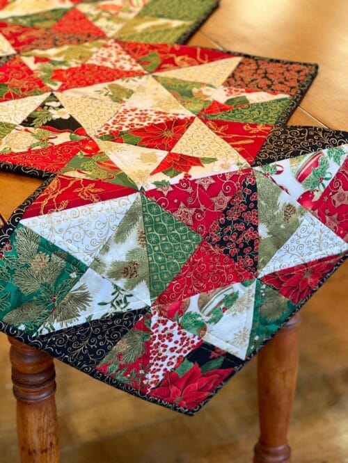 Holiday Stars table runner pattern draped on wood table