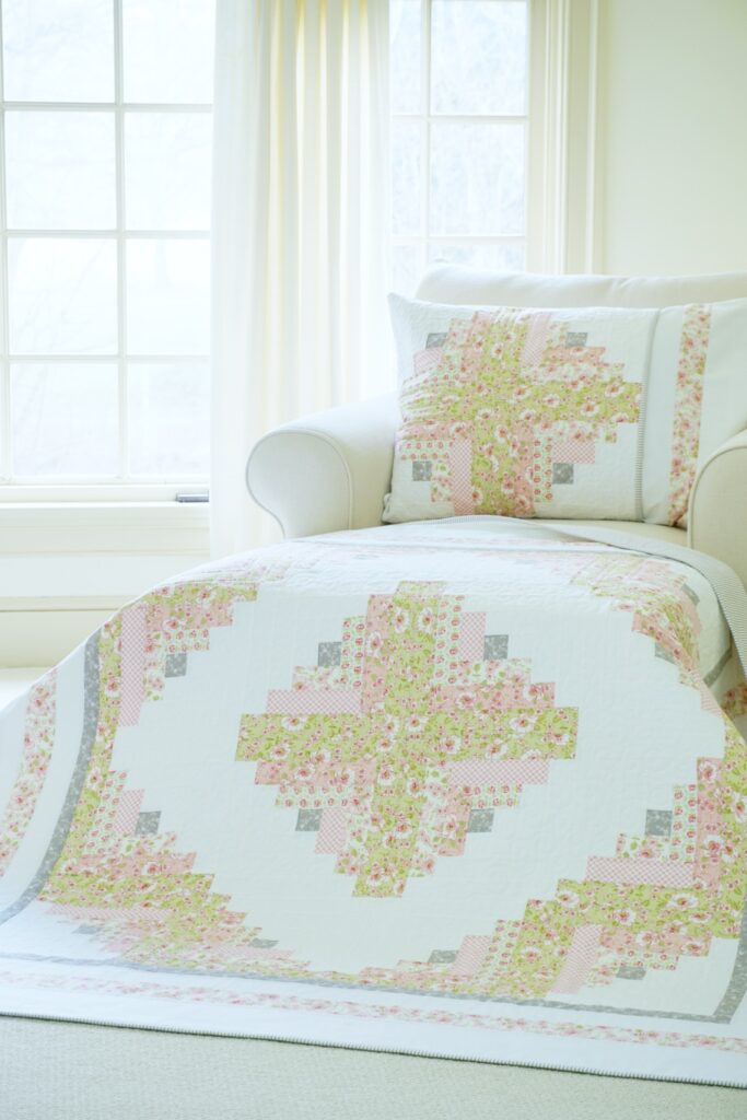 Log Cabin Jubilee Quilt draped on Chaise