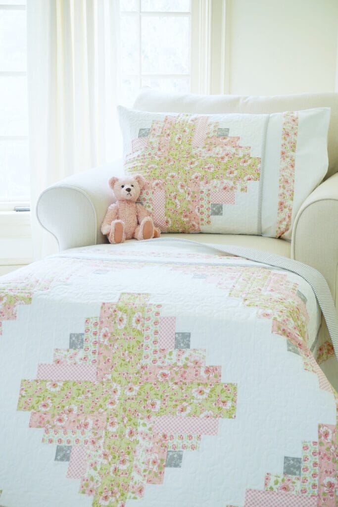 Log Cabin Jubilee Quilt on Chaise with Pink Bear