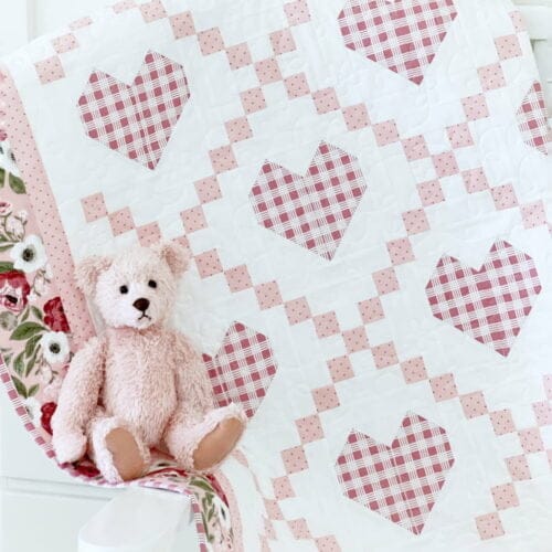 Hearts Delight quilt with pink bear