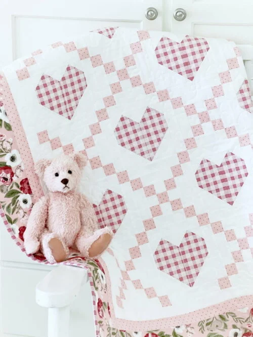 Hearts Delight quilt with pink bear